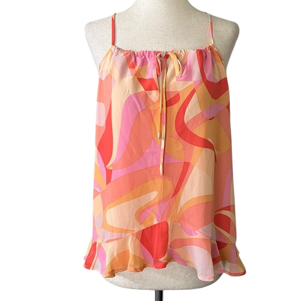Aqua flowy camisole top with a wavy, abstract pattern